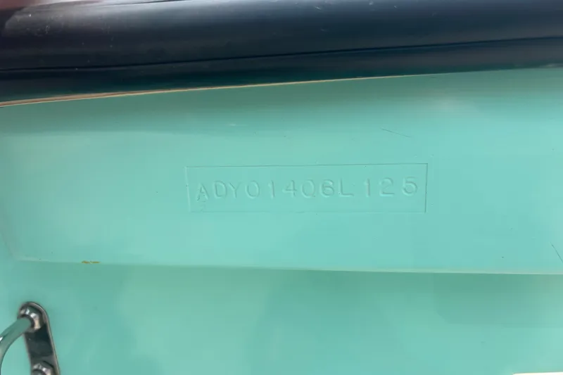 Slide: The Image of Hull identification number on a 2025 Exuma 14 Snookaholic boat. - 32