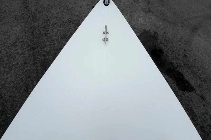 Slide: The Image of Bow of 2025 Exuma 14 Snookaholic boat on asphalt surface. - 30