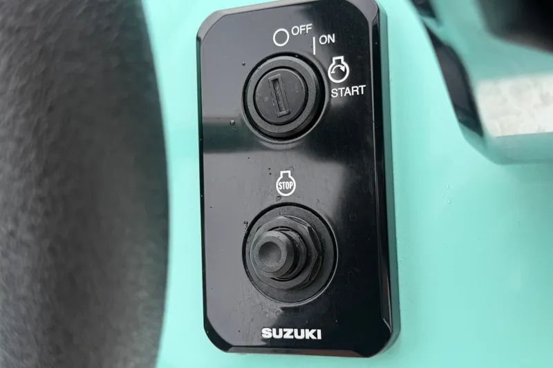 Slide: The Image of Close-up of Suzuki ignition panel on 2025 Exuma 14 Snookaholic boat. - 20