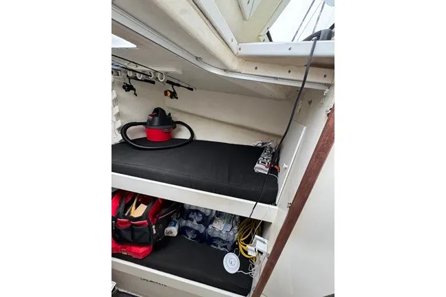 Slide: The Image of Interior of 1999 Markley 46 Chesapeake boat with storage and equipment. - 10