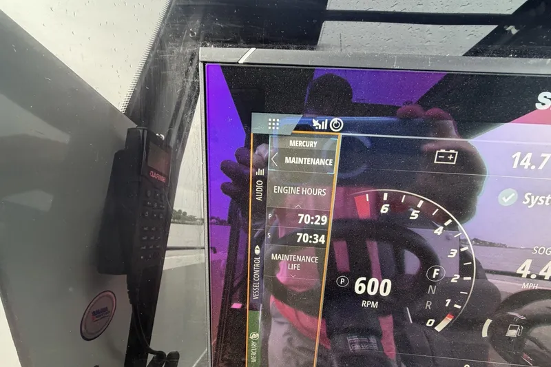 Slide: The Image of Dashboard of 2023 XO DFNDR 9 showing engine hours and RPM. - 5