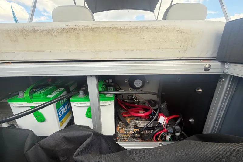 Slide: The Image of Battery compartment of 2025 Godfrey Sweetwater 2286 SFL pontoon boat. - 26