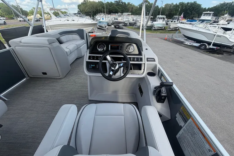 Slide: The Image of Interior view of 2025 Godfrey Sweetwater 2286 SFL boat with modern helm and seating. - 33
