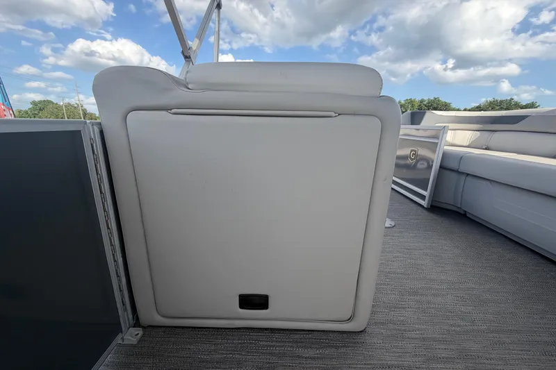 Slide: The Image of 2025 Godfrey Sweetwater 2286 SFL boat interior with plush seating and open sky view. - 42