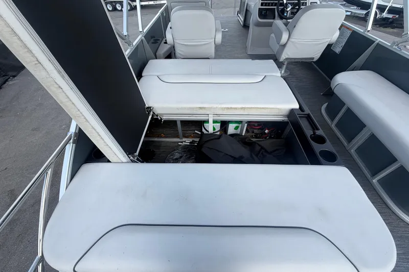 Slide: The Image of 2025 Godfrey Sweetwater 2286 SFL pontoon boat interior with open storage compartments. - 25