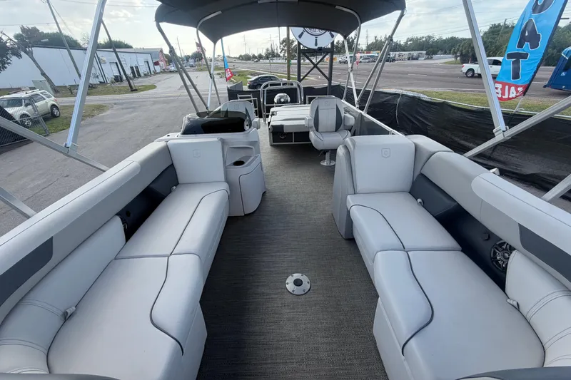 Slide: The Image of 2025 Godfrey Sweetwater 2286 SFL pontoon boat interior with spacious seating and modern design. - 15