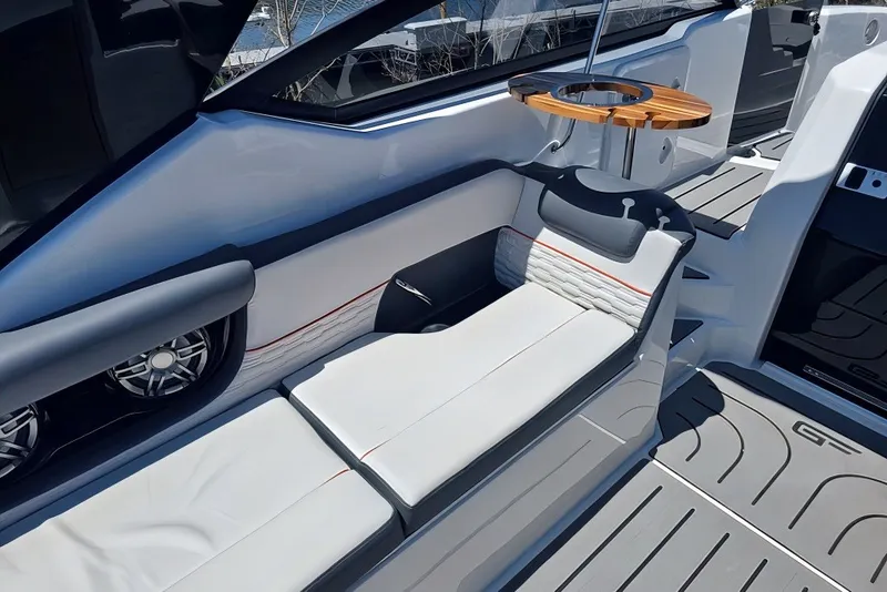 Slide: The Image of Luxurious interior of 2025 Grandfort 300 GTS boat with sleek seating and modern design. - 15