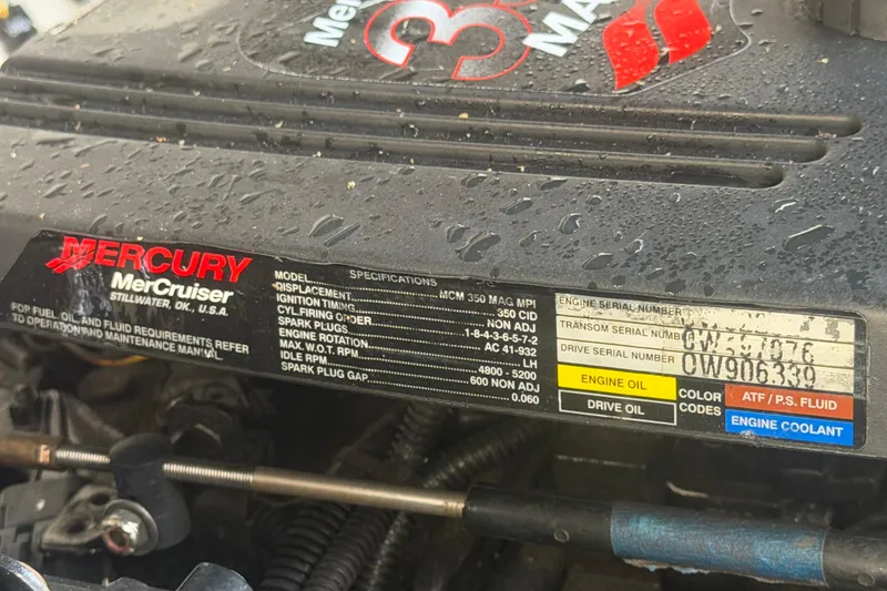 Slide: The Image of Close-up of a Mercury MerCruiser engine label on a 2006 Sea Ray 250 Amberjack boat. - 62