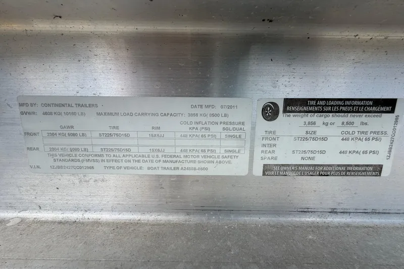 Slide: The Image of Label on Continental Trailers boat trailer, detailing tire and load specifications. - 67