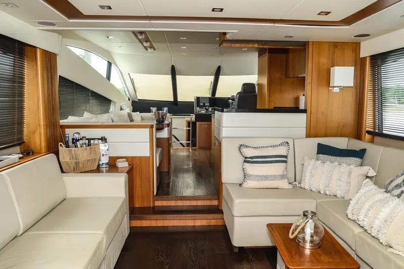 Slide: The Image of Luxurious interior of 2016 Sunseeker Manhattan 65 yacht with elegant seating and wooden accents. - 18