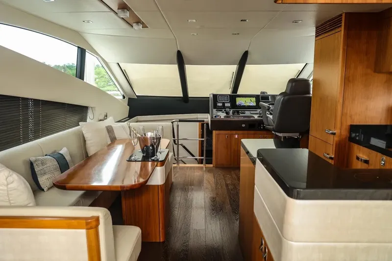 Slide: The Image of Luxurious interior of 2016 Sunseeker Manhattan 65 yacht with elegant seating and modern helm. - 17