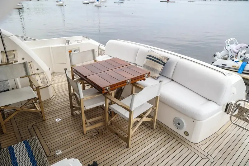 Slide: The Image of Luxury Sunseeker Manhattan 65 yacht deck with seating and table, 2016 model. - 24
