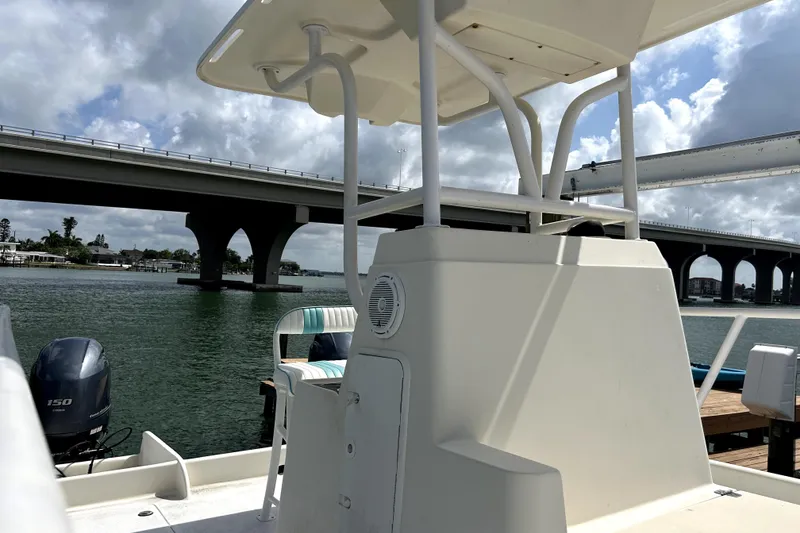Slide: The Image of 2014 Custom Exuma Catamaran 32 docked near a bridge on a sunny day. - 36