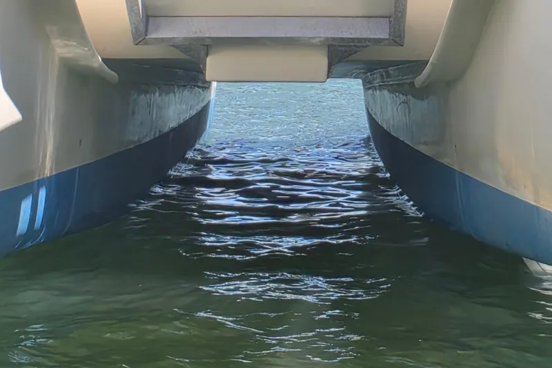 Slide: The Image of Underwater view of 2014 Custom Exuma Catamaran 32 hulls in clear water. - 41