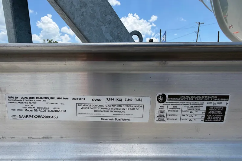 Slide: The Image of Trailer label showing specifications and compliance details for Savannah 210X, 2025 model. - 61