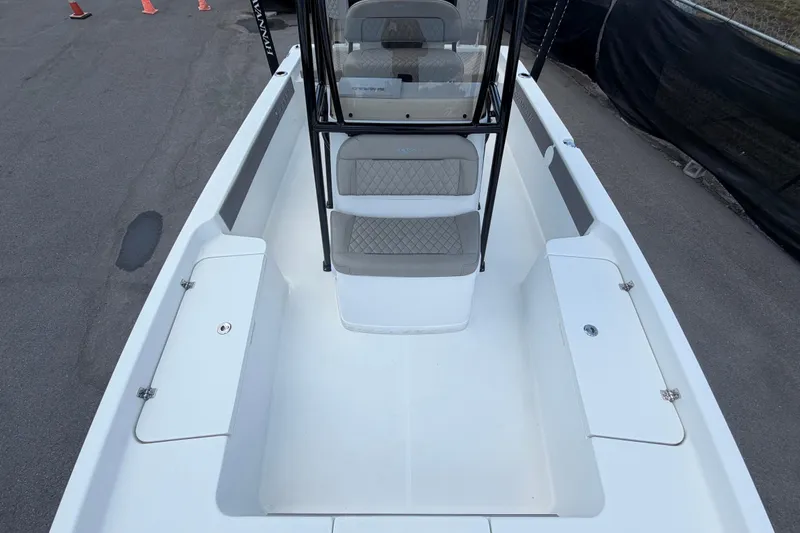 Slide: The Image of 2025 Savannah 210X boat interior with seating and storage compartments. - 43