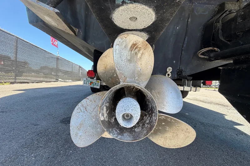Slide: The Image of Propeller of a 2006 Sea Ray 300 Sundancer boat on a trailer. - 6