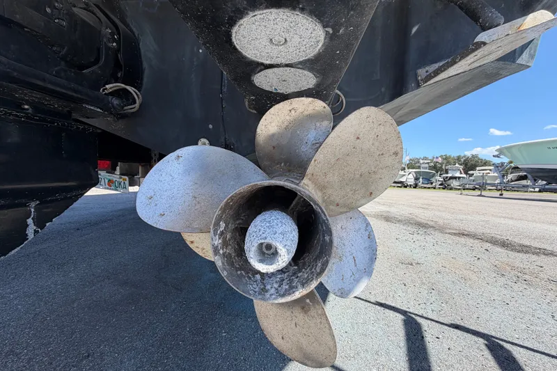 Slide: The Image of Propeller of 2006 Sea Ray 300 Sundancer boat on dry dock, close-up view. - 5