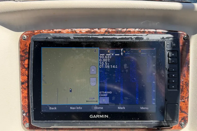 Slide: The Image of Garmin marine GPS display on 2006 Sea Ray 300 Sundancer boat dashboard. - 30