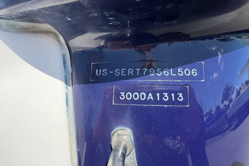 Slide: The Image of Hull identification number on a 2006 Sea Ray 300 Sundancer boat. - 115