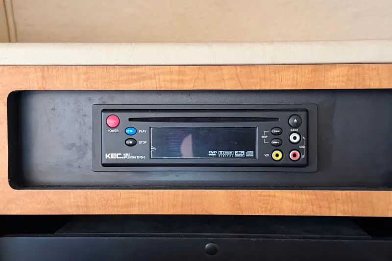 Slide: The Image of KEC DVD player in 2006 Sea Ray 300 Sundancer boat interior. - 72