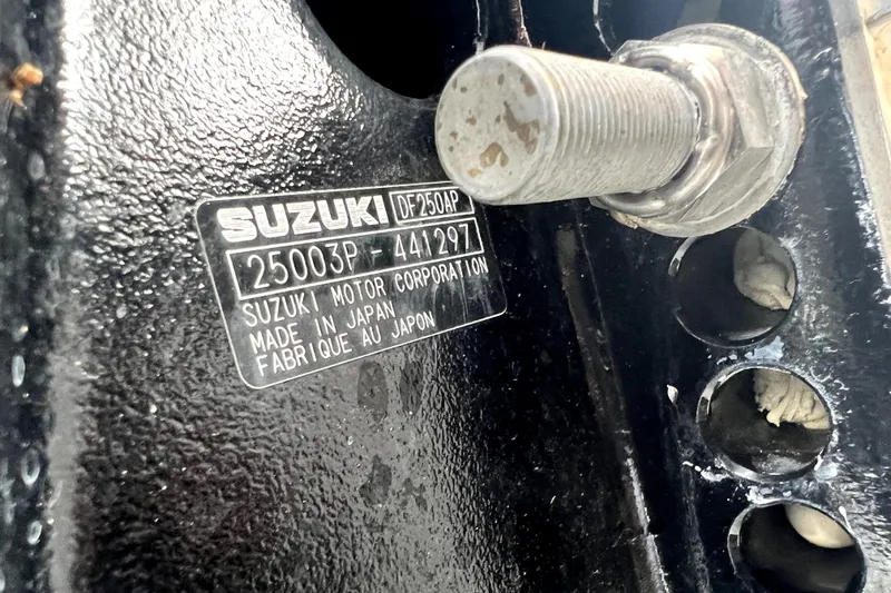 Slide: The Image of Close-up of Suzuki DF250AP engine plate on 2014 Robalo R265 Walkaround boat. - 18
