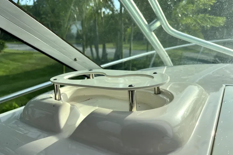 Slide: The Image of 2014 Robalo R265 Walkaround boat interior detail with window view. - 112