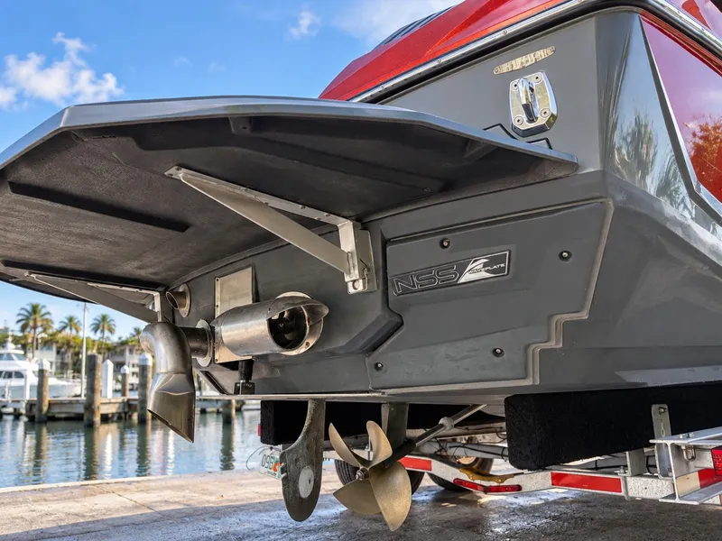 Slide: The Image of The image shows the stern of a 2019 Nautique Super Air Nautique G23 with an advanced propulsion system. - 9