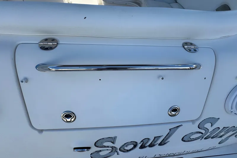 Slide: The Image of 2006 Sea Ray 340 Sundancer boat detail with chrome handle and white finish. - 14