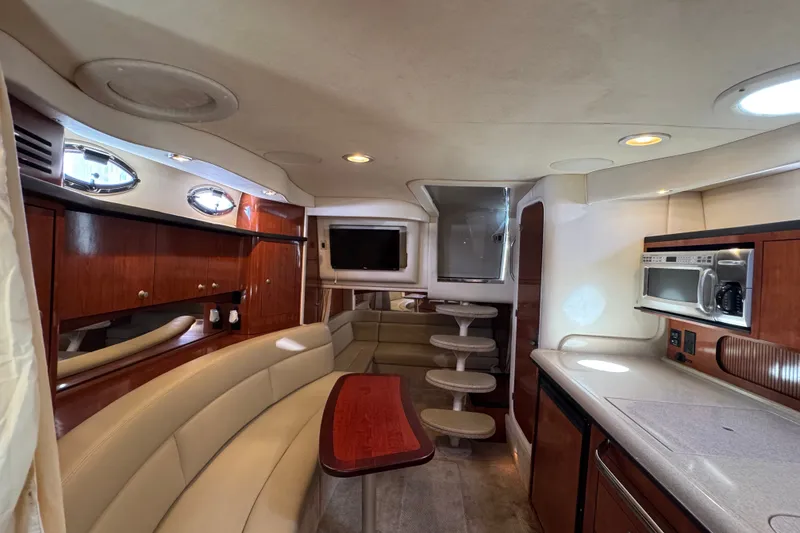 Slide: The Image of Luxurious 2006 Sea Ray 340 Sundancer yacht interior with elegant seating and modern amenities. - 67