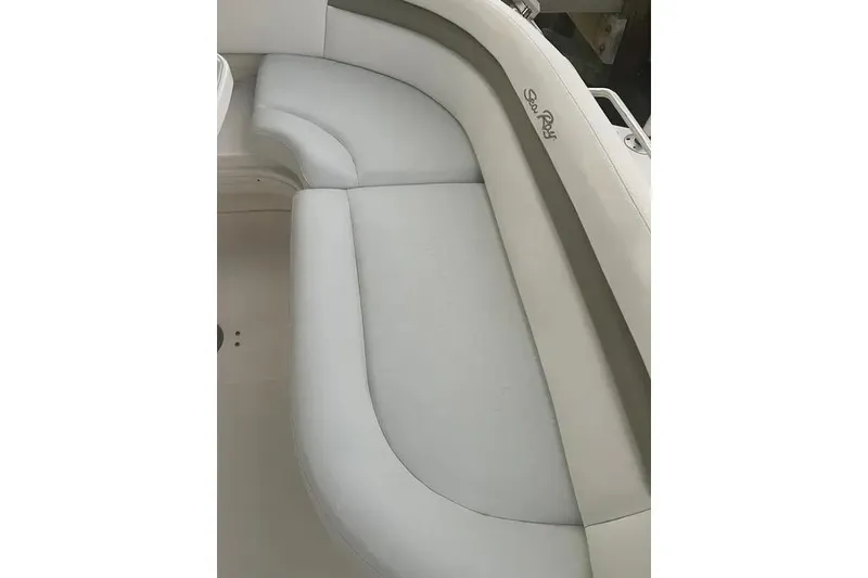 Slide: The Image of 2006 Sea Ray 340 Sundancer boat seating, featuring elegant white upholstery. - 17