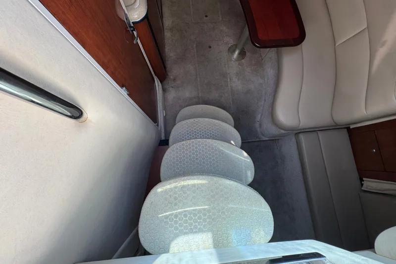 Slide: The Image of Interior of a 2006 Sea Ray 340 Sundancer boat with seating and table. - 60