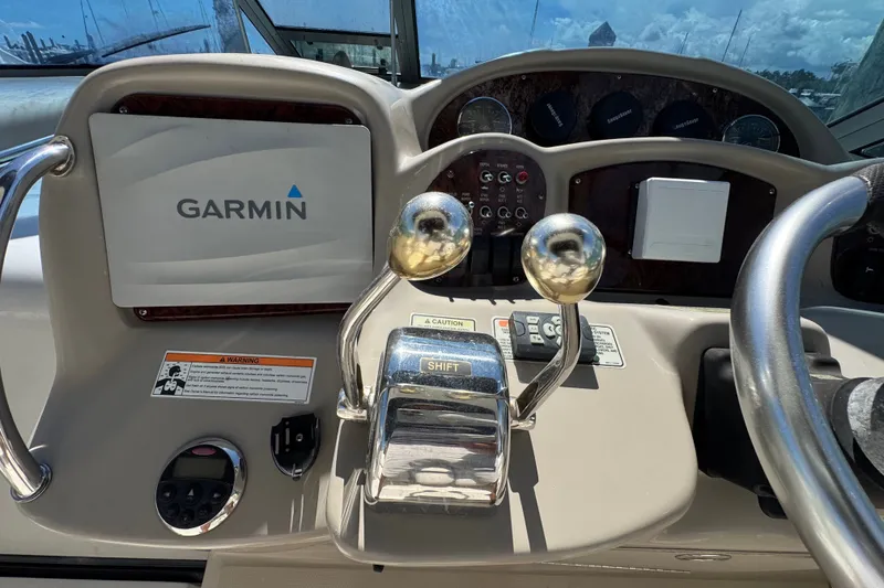 Slide: The Image of Control panel of a 2006 Sea Ray 340 Sundancer with Garmin navigation system. - 42