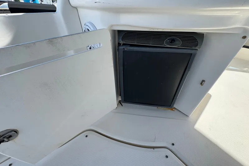 Slide: The Image of 2006 Sea Ray 340 Sundancer interior with built-in mini fridge. - 26