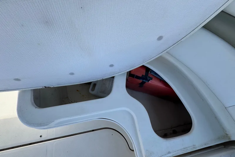 Slide: The Image of Storage compartments on a 2006 Sea Ray 340 Sundancer boat deck. - 25