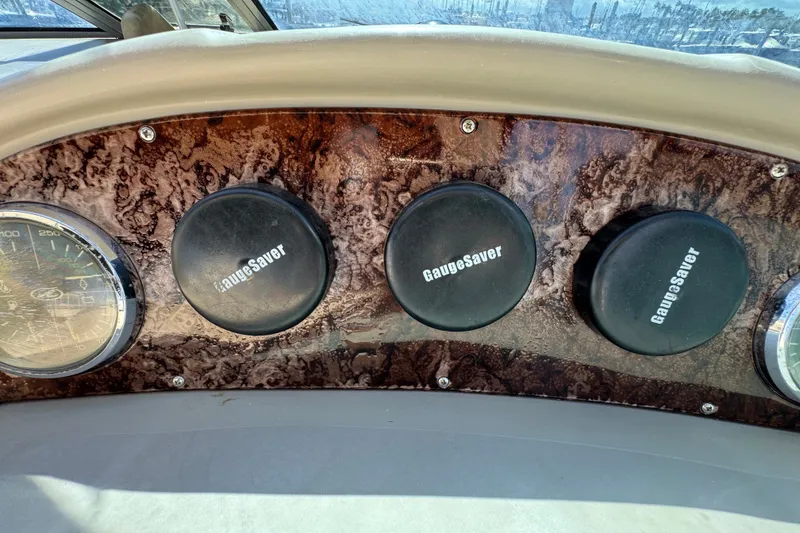 Slide: The Image of Dashboard of 2006 Sea Ray 340 Sundancer with GaugeSaver covers. - 48