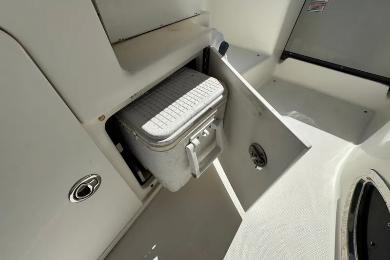 Slide: The Image of Storage compartment with cooler on 2006 Sea Ray 340 Sundancer boat. - 29