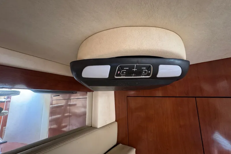 Slide: The Image of Ceiling control panel inside 2006 Sea Ray 340 Sundancer boat cabin. - 73