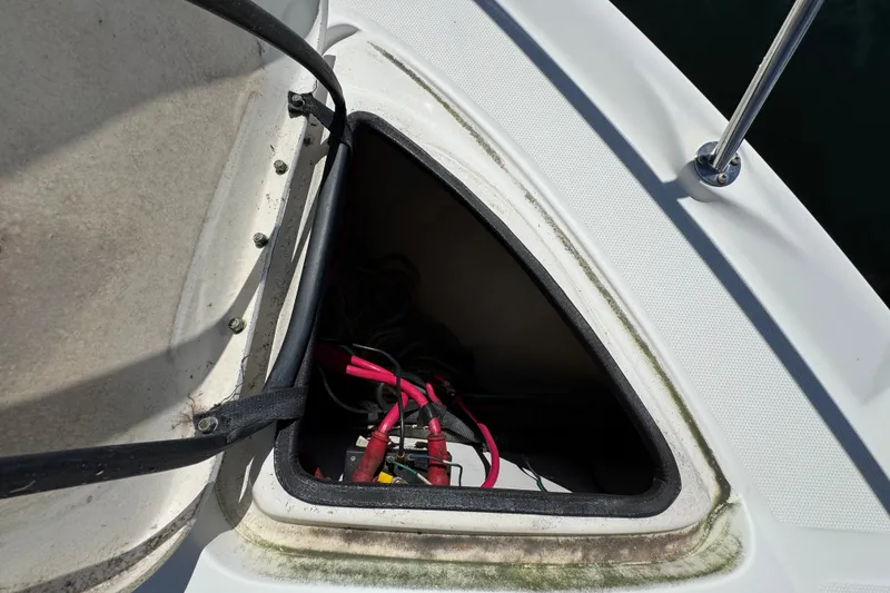 Slide: The Image of Open hatch on 2006 Sea Ray 340 Sundancer boat, revealing internal wiring. - 52