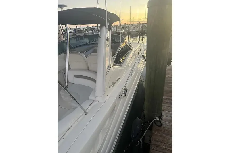 Slide: The Image of 2006 Sea Ray 340 Sundancer docked at marina during sunset. - 18