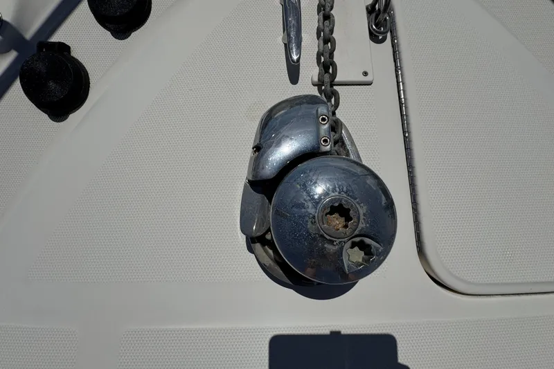 Slide: The Image of Anchor windlass on 2006 Sea Ray 340 Sundancer boat deck. - 53