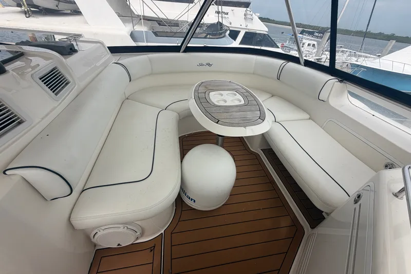 Slide: The Image of Luxurious seating area on a 2006 Sea Ray 550 Sedan Bridge yacht. - 57