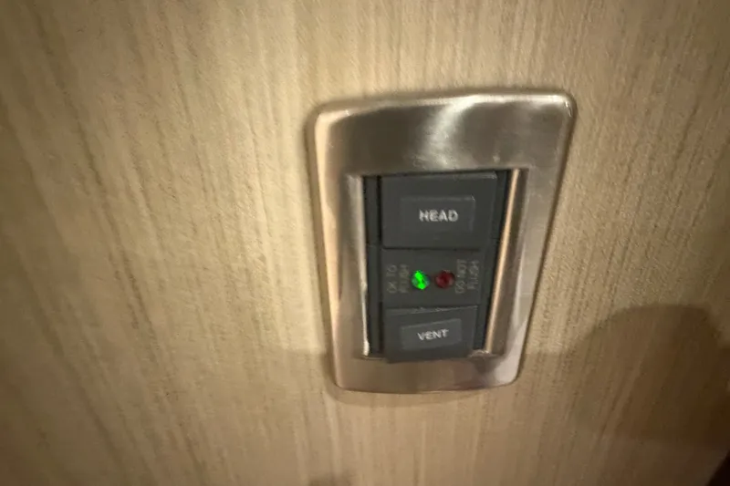 Slide: The Image of Control panel on 2006 Sea Ray 550 Sedan Bridge yacht interior wall. - 86