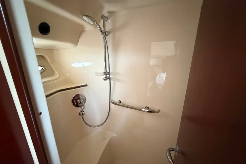 Slide: The Image of Shower area in 2006 Sea Ray 550 Sedan Bridge yacht, featuring sleek design and modern fixtures. - 136