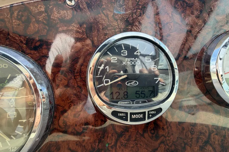 Slide: The Image of Close-up of 2006 Sea Ray Sundancer 320 RPM gauge on wooden dashboard. - 61