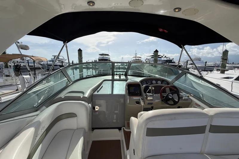 Slide: The Image of Cockpit view of 2006 Sea Ray Sundancer 320 yacht docked at marina. - 40