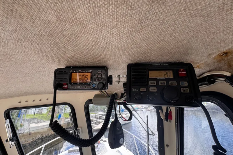 Slide: The Image of Interior view of a 2005 Atlas Boat Works Acadia 25 with marine radios installed. - 22