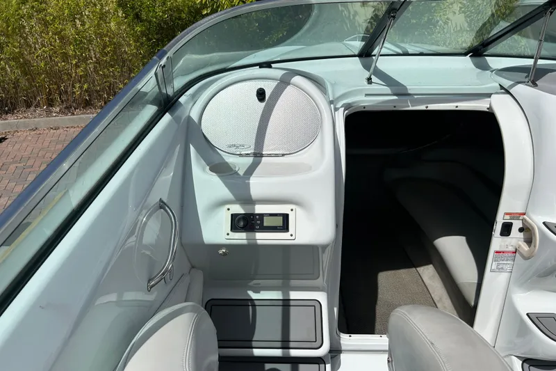 Slide: The Image of 2005 Baha Cruisers 302 boat interior with seating and cabin entrance. - 24