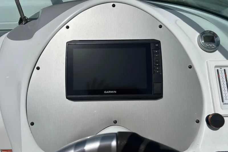 Slide: The Image of Dashboard of a 2005 Baha Cruisers 302 with Garmin navigation system. - 33