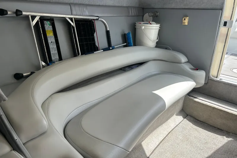 Slide: The Image of Interior of a 2005 Baha Cruisers 302 boat with seating and storage. - 57